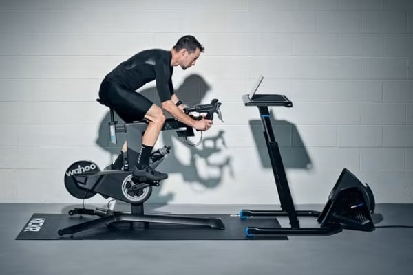 Someone riding a Wahoo Kickr smart bike