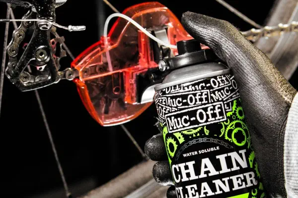 applying muc-off chain cleaner