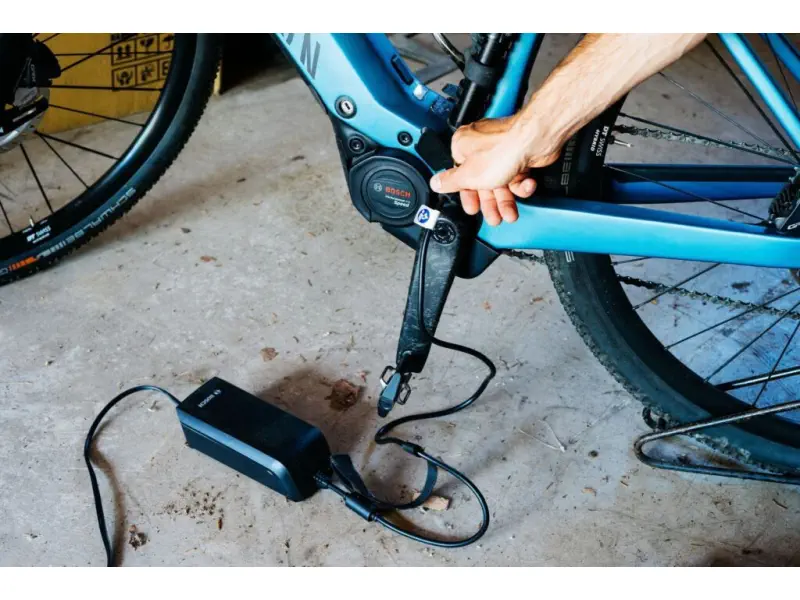 plugging a charge into an ebike